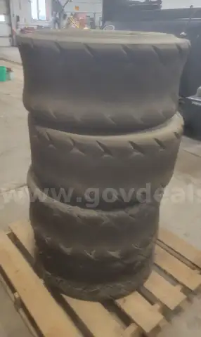 Skid Loader Wheels and Tires (Lot of Qty. 4)