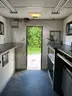 COACH CRAFT SPLICE ENCLOSED TRAILER W/ CUMMINS ONAN P4500I DIGITAL INVERTER GENERATOR