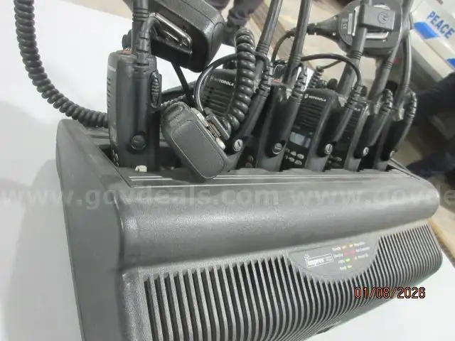Lot of 6 VHF Motorola HT 1250 Radios/Batteries - includes 6 Bank Charging Station