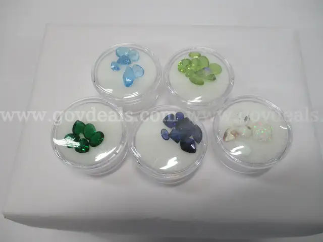 Lot Of Gems - Assorted Colors and Shapes, Gem Status not Authenticated.