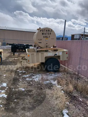 Water tank and trailer