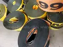 13 flatbed Kinedyne heavy duty straps, 4 heavy duty chain straps and 5 heavy duty recovery straps