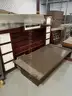 Lot of desks, tables, shelves