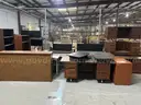 Lot of desks, tables, shelves