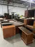 Lot of desks, tables, shelves