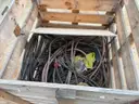 17 reels (12 steel + 5 wooden) of scrap spooled electrical distribution cable and 2 pallets and 1 crate of scrap (LOT 7)
