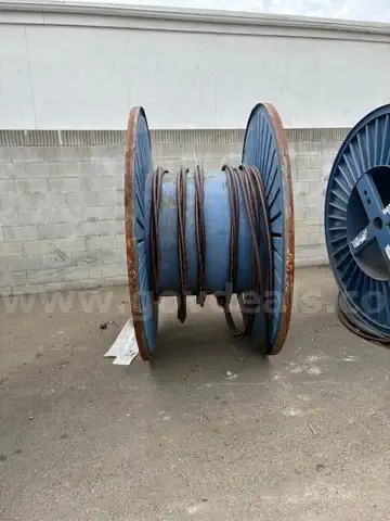 17 reels (12 steel + 5 wooden) of scrap spooled electrical distribution cable and 2 pallets and 1 crate of scrap (LOT 7)