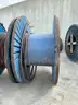 24 reels (13 steel + 11 wooden) of scrap spooled electrical distribution cable and 5 pallets scrap (LOT 8)