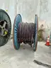24 reels (13 steel + 11 wooden) of scrap spooled electrical distribution cable and 5 pallets scrap (LOT 8)