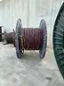 24 reels (13 steel + 11 wooden) of scrap spooled electrical distribution cable and 5 pallets scrap (LOT 8)