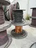 24 reels (13 steel + 11 wooden) of scrap spooled electrical distribution cable and 5 pallets scrap (LOT 8)