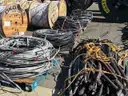 20+ pallets of chopped scrap, 19+ reels of coiled scrap, 3 steel tilt dump bins