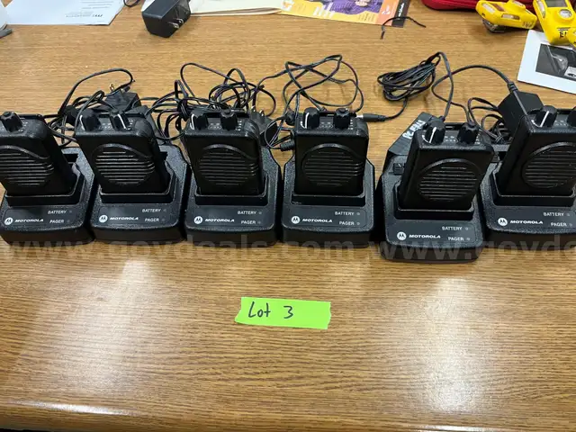 Lot #3 of 6 Minitor 5 Pagers, Bases, and Batteries.