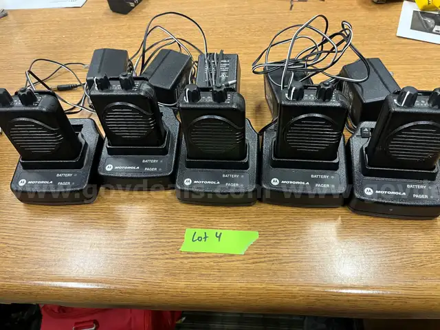 Lot #4 of 5 Minitor 5 Pagers, Bases, and Batteries.