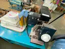 (2) Sewing Machines, (1) Button Press, (1) Heat Press