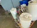 Pallet of Laundry Chemicals w/ Dispenser &#x26; (11) Double Linen Carts