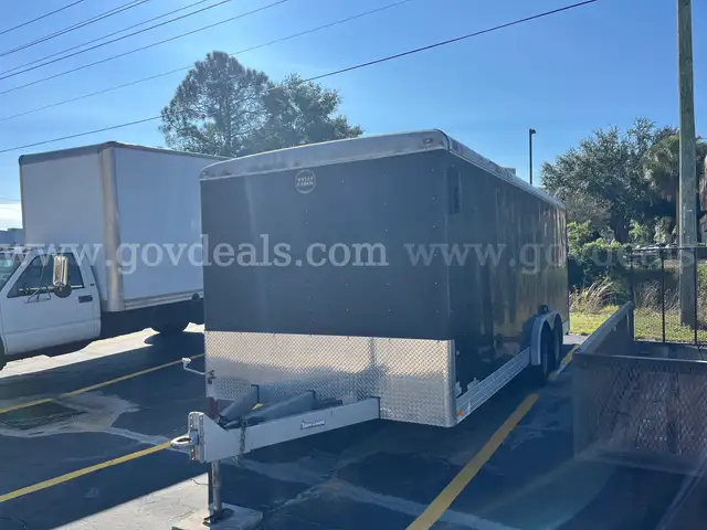 One (1) Black Enclosed Trailer