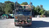 2016 Peterbilt 320 with 28YD Heil half pack