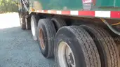 2016 Peterbilt 320 with 28YD Heil half pack