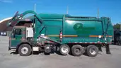 2016 Peterbilt 320 with 28YD Heil half pack