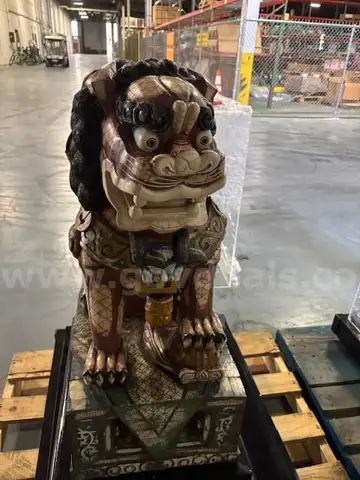 Stone Sculpture, Black Pedestal in Display Case.