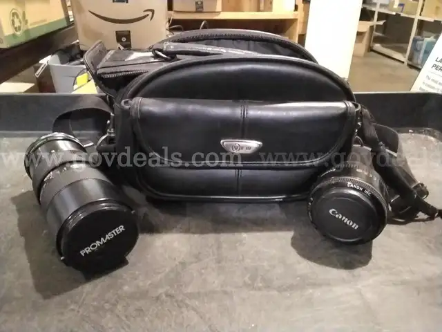 Canon and promaster camera lens