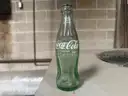 Lot of Coca Cola bottles