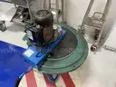 Slurry mixing vessel