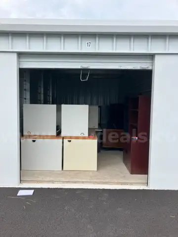 10&#x27;X20&#x27; Storage Unit Full of Office Furniture (Desks, Shelving Units, and Chairs) ALL ITEMS MUST BE REMOVED FROM UNIT