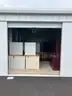 10&#x27;X20&#x27; Storage Unit Full of Office Furniture (Desks, Shelving Units, and Chairs) ALL ITEMS MUST BE REMOVED FROM UNIT