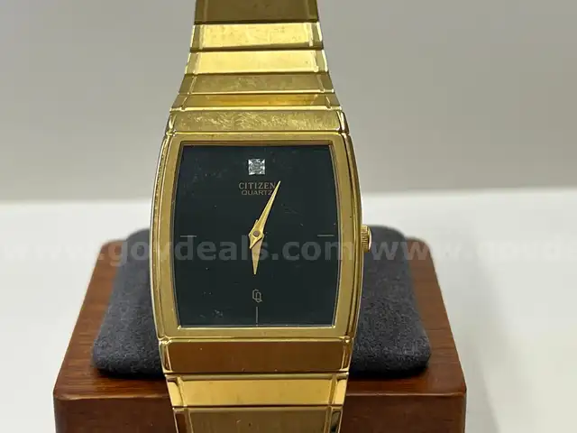 Gold Tone Citizen Quartz Watch and Gold Star Stud Earring