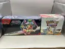 Lot of 2 Boxes of Pok&#xE9;mon Scarlet &#x26; Violet Prismatic Evolutions Surprise Box &#x26; Scarlet &#x26; Violet Surging Sparks