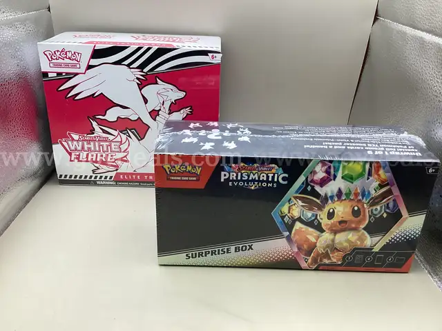 Lot of 2 Boxes of Pok&#xE9;mon Scarlet &#x26; Violet Prismatic Evolutions Surprise Box, White Flare Elite Training Box 