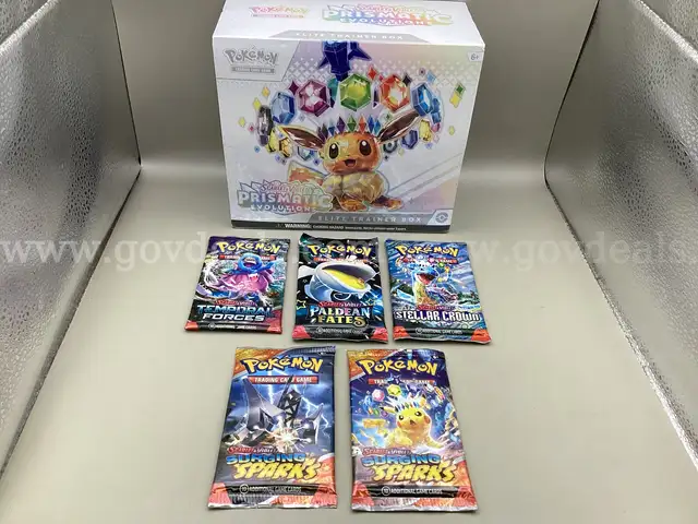 1 box of Scarlet &#x26; Violet Prismatic Evolutions Elite Training Box and 5 assorted Booster Packs