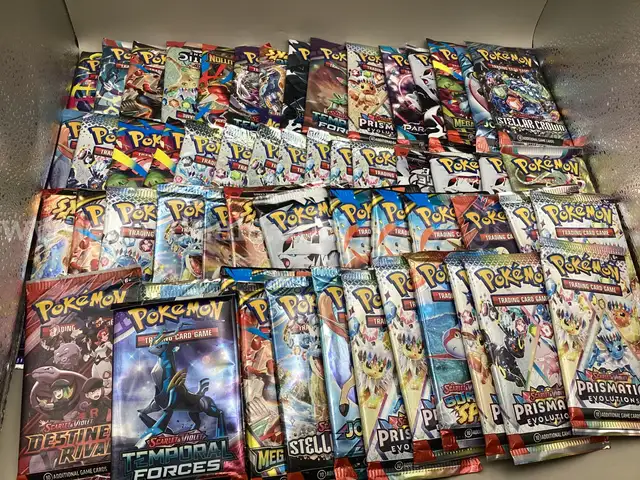 57 assorted Pok&#xE9;mon Booster Packs 