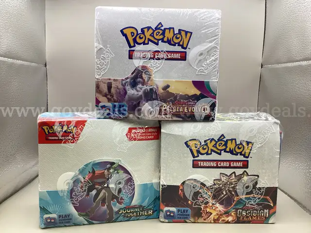 Lot o 3 Boxes of Pokemon: Obsidian Flames, Paldea Evolution, &#x26; Journey Together 