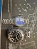 (1) Michael Kors Watch (1) Invicta Watch (1) pair of Michael Kors Sun Glasses