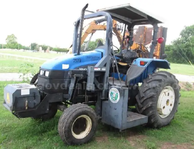2002 FORD NEW HOLLAND TS100 TRACTOR PLUS ATTACHMENT