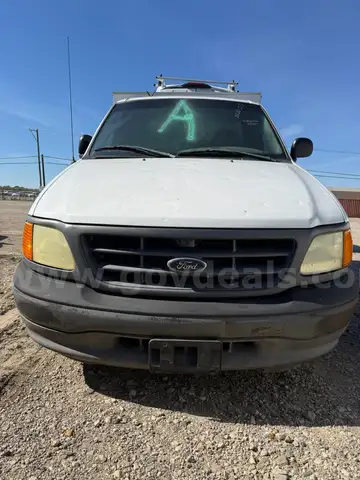 2004 Ford F-150 Heritage with 2009 Deerskin AC18G Body