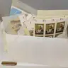 Large Mixed Lot- Hundreds of Stamps (some mint), Foreign Currency, and Jewelry