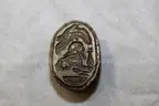 Bolo Ties, Stones, and Carved Images