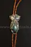 Bolo Ties, Stones, and Carved Images