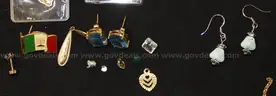 1/4oz Gold Coin, Suisse Gold Pendants, Jewelry, Earrings, and Various Watches (35.5 grams total in precious metals)