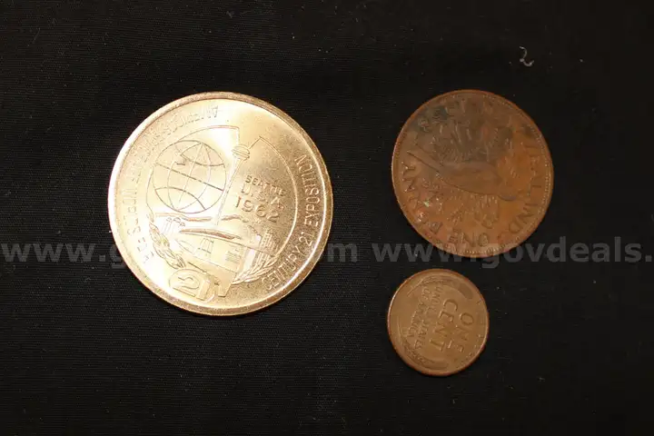 Wheat Penny, New Zealand Penny, and 1962 World Fair Token