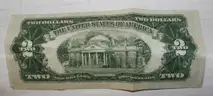 Mixed Lot- Sterling Silver Ring with Unverified Blue Stone, Rednote $1 Bill, and Other Currency