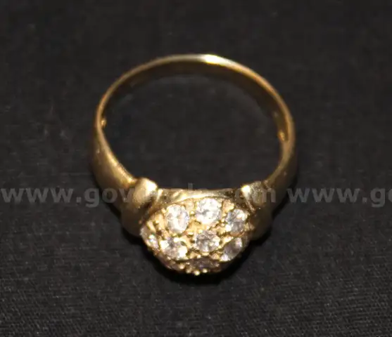 Gold Colored Ring and Jewelry Beads