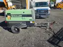 Tow behind air compressor