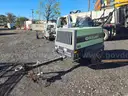 Tow behind air compressor