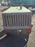 Tow behind air compressor