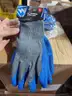 Large wholesale lot of new work/safety gloves in various colors, brands, and sizes. Great for industrial use, resale